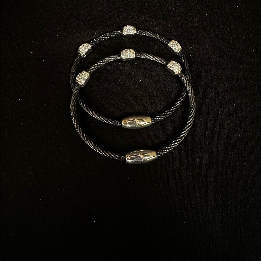 Wire cable and silver tone bracelets with crystal